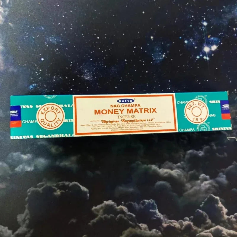 Sriyana Money Matrix incense packaging on a dark background