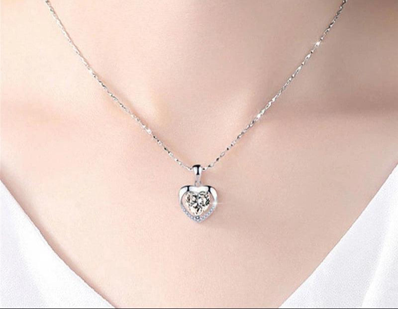 Elegant heart necklace with Austrian crystal pendant for formal outfits, romantic occasions, and stylish accessory wear.