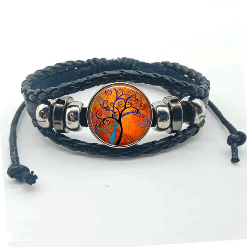 Layered boho Tree of Life charm bracelet with leather bands for trend-forward fashion and everyday wrist wear.