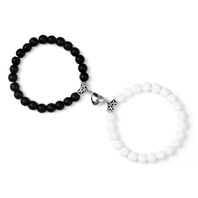 Minimalist heart magnet couple bracelets for simple romantic wear, matching couples jewelry, and everyday use.
