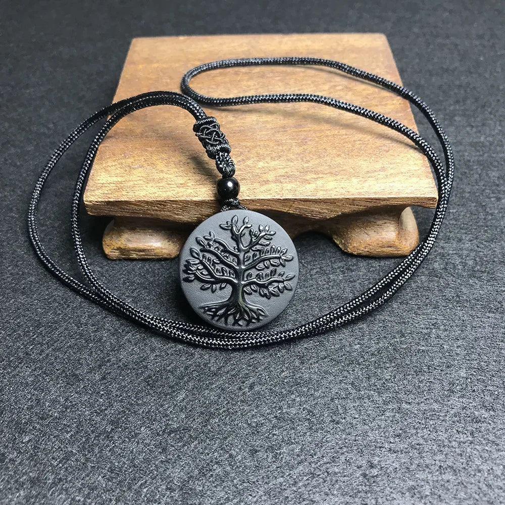 Natural Black Obsidian Tree of Life jewelry pendant for spiritual grounding, energy shielding, and daily use.