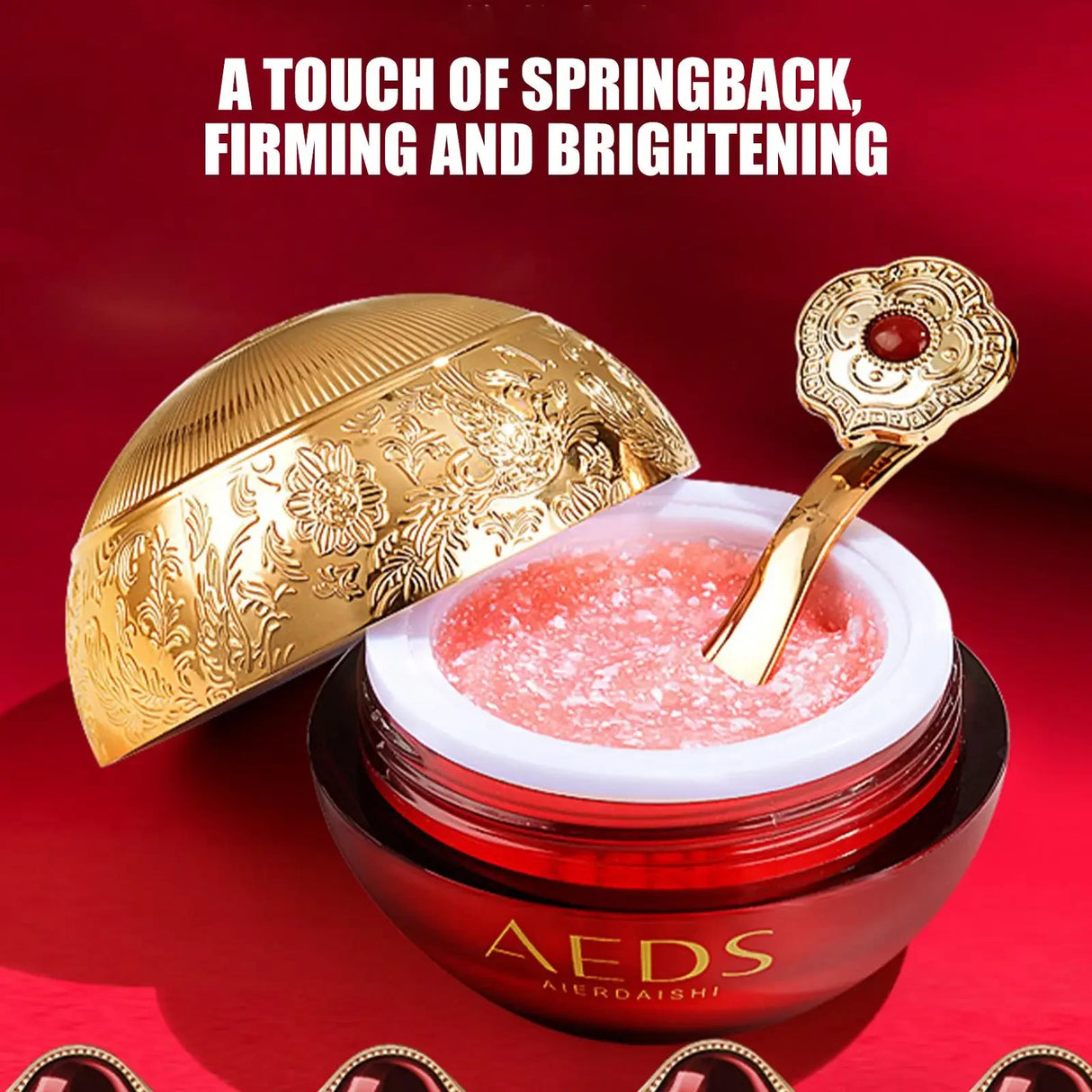 SAKSRAAR Dragon Blood Cream red jar with gold lid and spoon on red background.