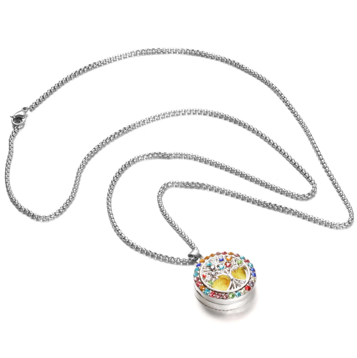Stainless steel Tree of Life diffuser locket pendant for essential oil use, calming aromatherapy, and personal scent wear.