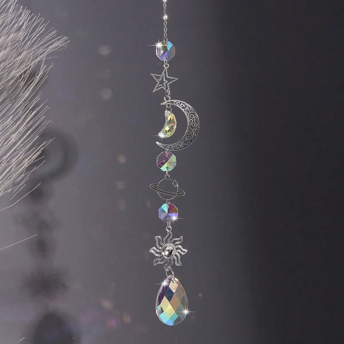 Suncatcher Crystal Star and Moon wall hanging with crystal accents for window décor, light reflection, and home decoration.