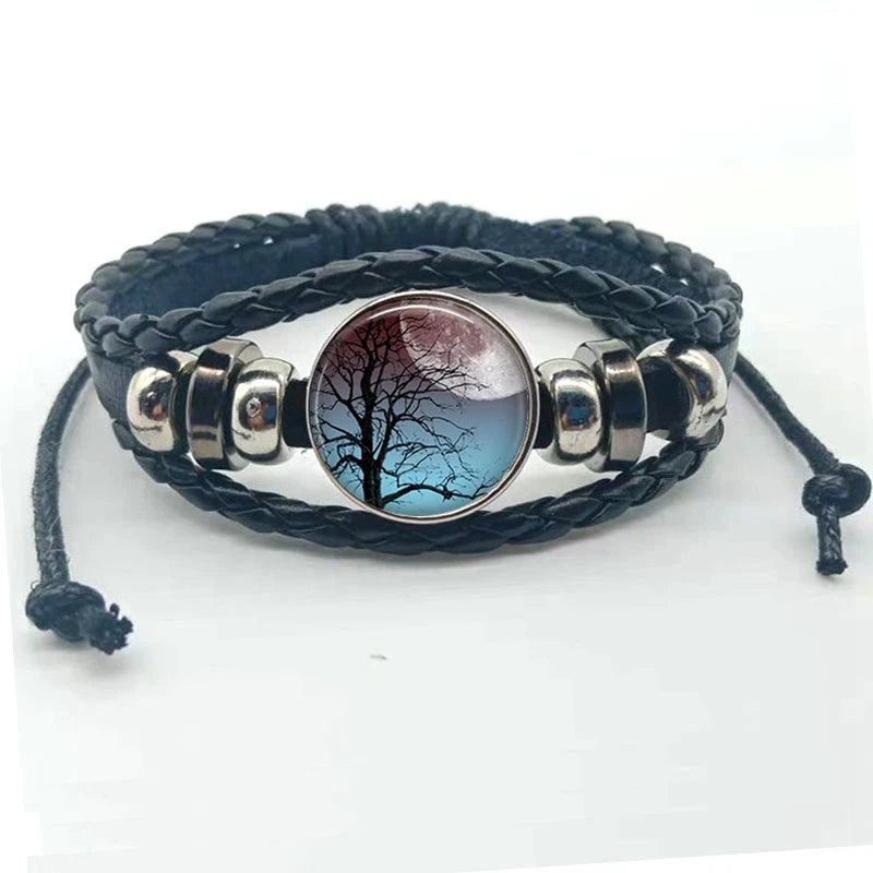 Tree of Life charm bracelet with leather strands for fashionable wrist wear and daily outfit accessorizing.