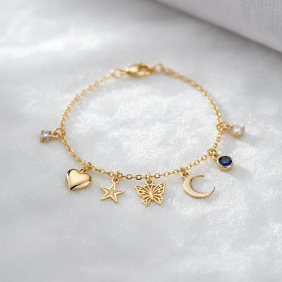 Charm Bracelet collection banner featuring handcrafted jewelry pieces with natural stones and metals, for everyday wear and spiritual adornment.