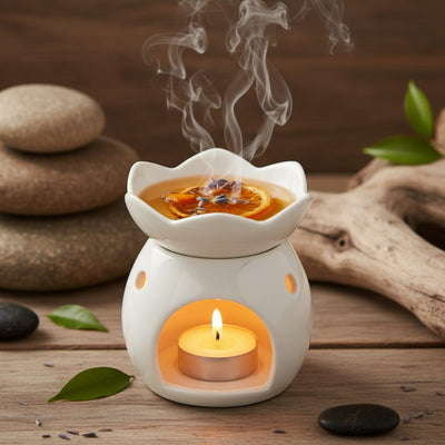 Oil Burner collection banner featuring an oil burner and diffuser setup with essential oils, for aromatherapy and home fragrance.