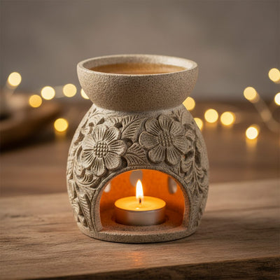 Soapstone Oil Burner collection banner featuring an oil burner and diffuser setup with essential oils, for aromatherapy and home fragrance.