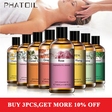 PHATOIL 100ml essential oils lined up in amber glass bottles, including chamomile, thyme, sweet orange, grapefruit, rose, ylang ylang, jasmine and peppermint.