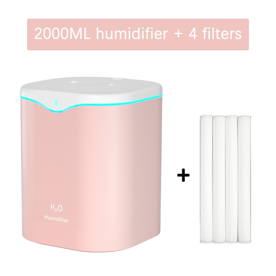 2000ML portable air humidifier with double nozzle mist output for hydrating indoor air and daily use in home or office settings.