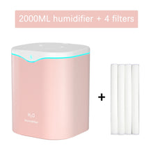 2000ML portable air humidifier with double nozzle mist output for hydrating indoor air and daily use in home or office settings.