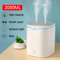 2000ML USB double spray air humidifier diffuser for adding moisture to dry indoor air and freshening bedrooms, offices, and living spaces.