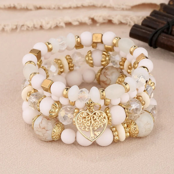 4Pcs Tree of Life Heart Bracelet Set with beaded and charm bracelets for everyday wear, layering, and gift giving.