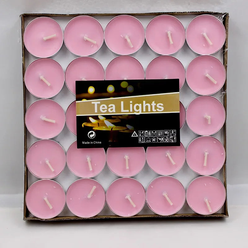 50pcs heart-shaped romantic tea light candle set for wedding decor, anniversary nights, and warm decorative lighting.