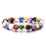 7 chakra braided energy healing bracelet for spiritual healing, chakra work, and relaxation practice.