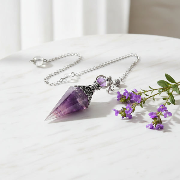 7 Chakra Crystal Pendulum for dowsing, divination, and energy work.
