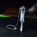 7 Chakra Crystal Pendulum with Wishing Bottle for dowsing, divination, and energy work.