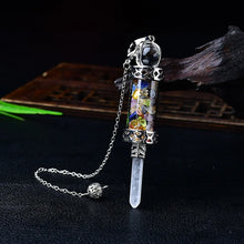 7 Chakra Crystal Pendulum with Wishing Bottle for dowsing, divination, and energy work.