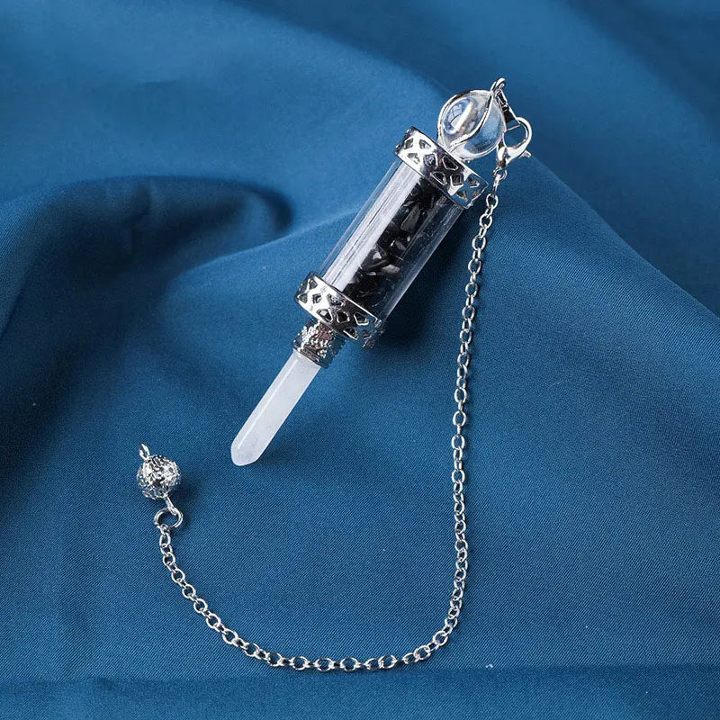 7 Chakra Crystal Pendulum with Wishing Bottle for dowsing, divination, and energy work.