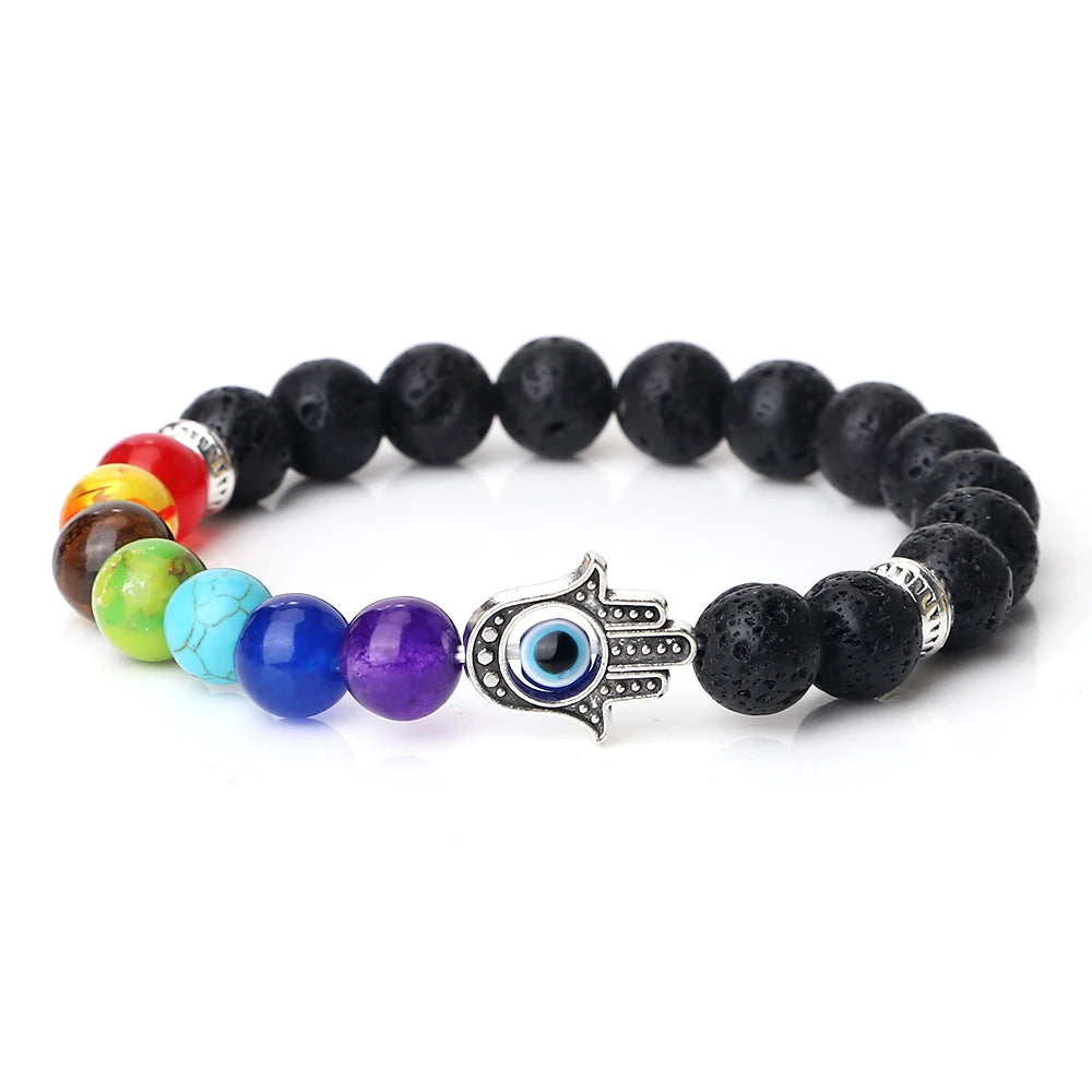 7 Chakra meditation bracelet with Tiger Eye, Lava, Onyx, and Agate beads for yoga sessions, prayer, and mindful relaxation.