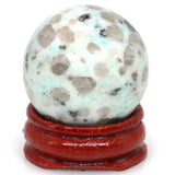 7 Chakra meditation crystal ball gemstone sphere for mindfulness, chakra alignment, and spiritual practice.