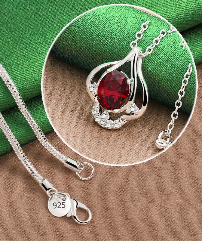 925 sterling silver pendant with red zircon bud design for fashion jewelry wear, layering, and special event accessorizing.