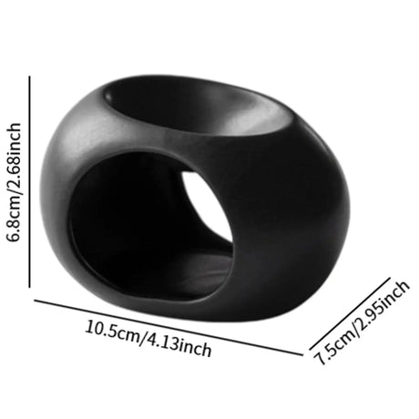 Black ring with measurements on a white background
