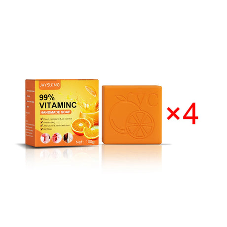 Orange soap bar with packaging labeled '99% Vitamin C' on a white background