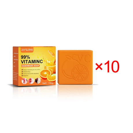 Orange soap bar with packaging labeled '99% Vitamin C' on a white background