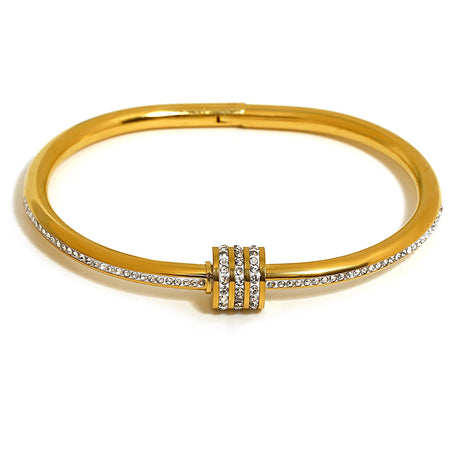 Gold bracelet with diamond accents on a white background