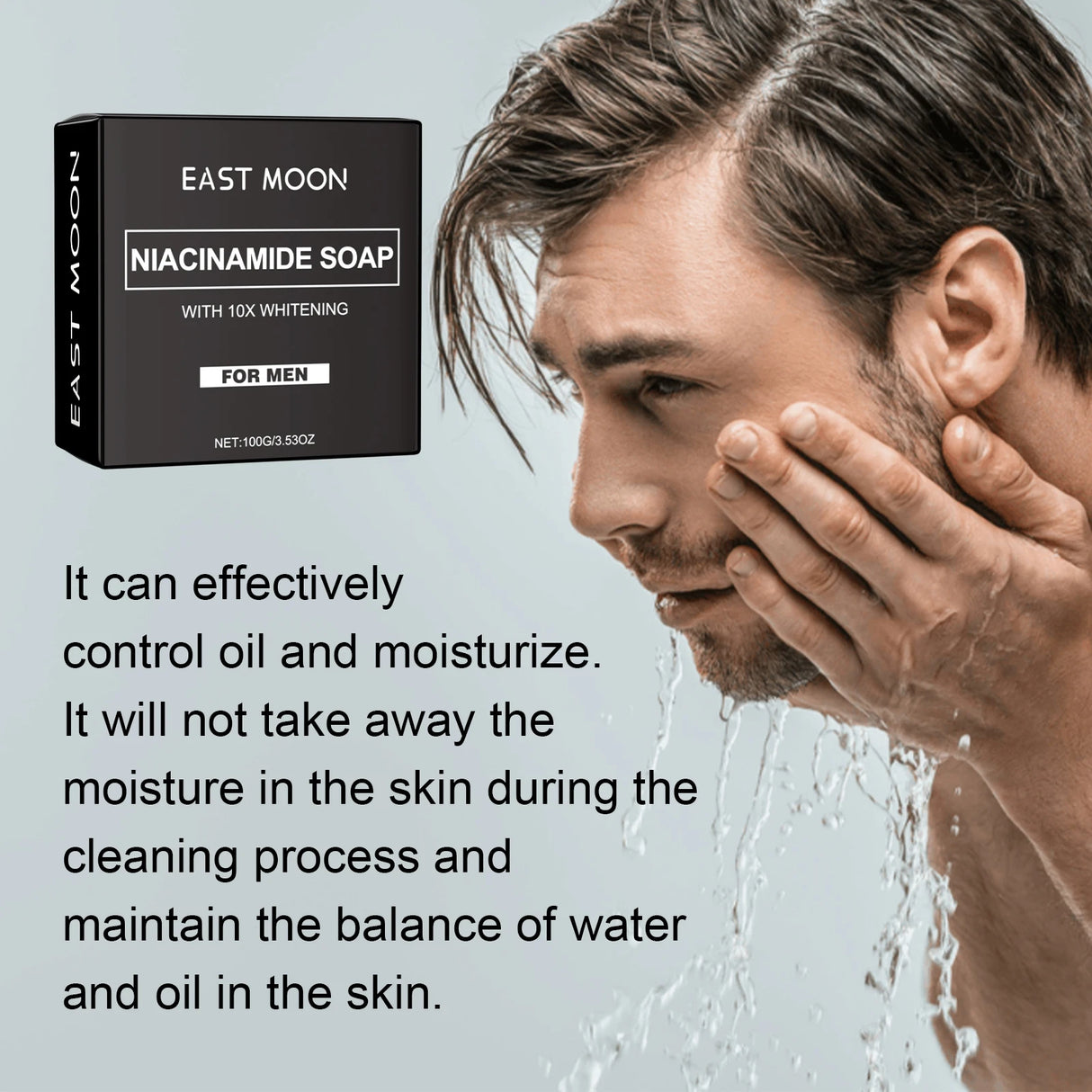 Man washing his face with a box of East Moon Niacinamide Soap on a light gray background