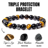 Triple protection bracelet with stones labeled for power, protection, and balance on a white background.