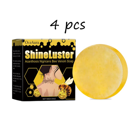 Yellow soap bar next to its packaging labeled 'ShineLuster' on a white background
