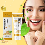 Oralhoe Ginger Fresh toothpaste with packaging and a woman smiling on a yellow background