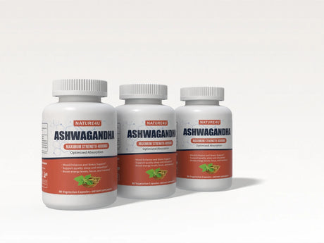 Three bottles of Nature's Plus Ashwagandha on a white background