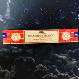 Box of Dragon's Blood incense with a starry night background
