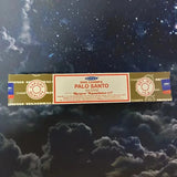 Box of Nag Champa Palo Santo incense on a starry night background