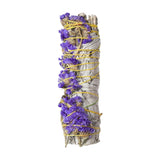 Bundled sage with lavender and yellow string on a white background