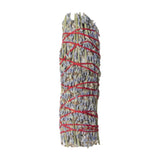 Bundled sticks tied with red string on a white background