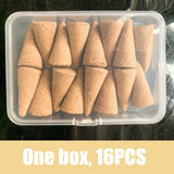 Clear plastic container with 16 brown incense cones on a dark background