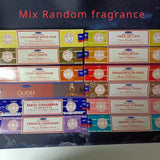 Collection of Nag Champa incense boxes with various fragrances on a dark background.