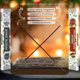 Incense sticks with White Sage and Frankincense Myrrh packaging against a warm, blurred background.