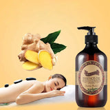 Essence oil bottle with a woman receiving a massage and ginger root on a yellow background