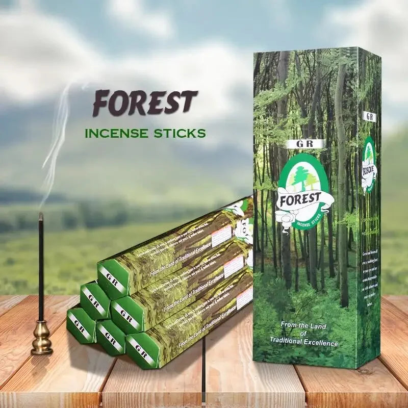 Forest incense sticks with packaging on a wooden surface and nature background