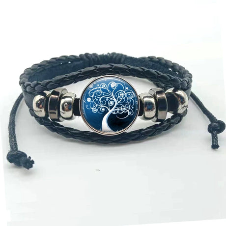 Black braided leather bracelet with silver accents and a blue circular design on a white background