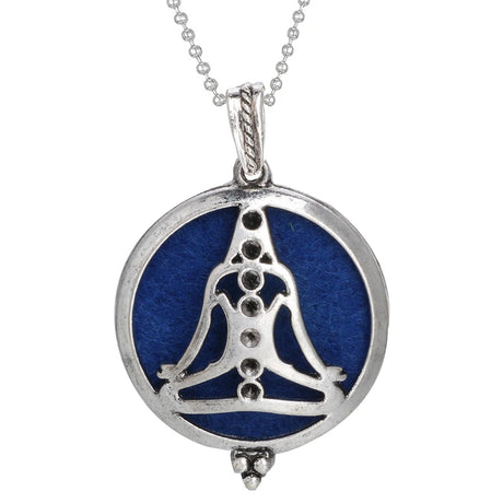 Silver pendant with blue circular design on a white background