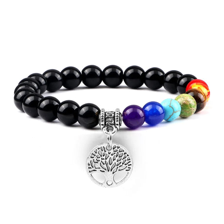 Bracelet with black beads and colorful stones on a white background