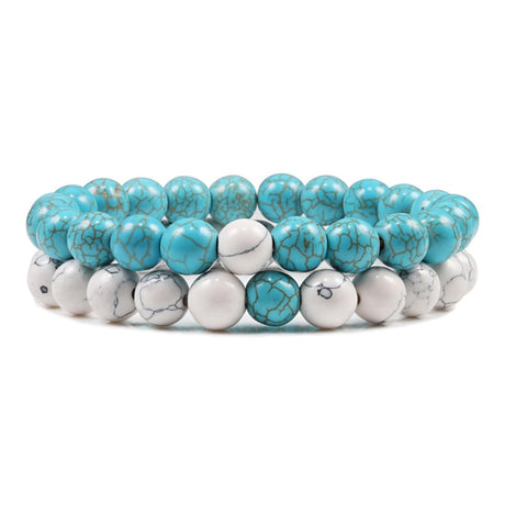 Turquoise and white beaded bracelet on a white background