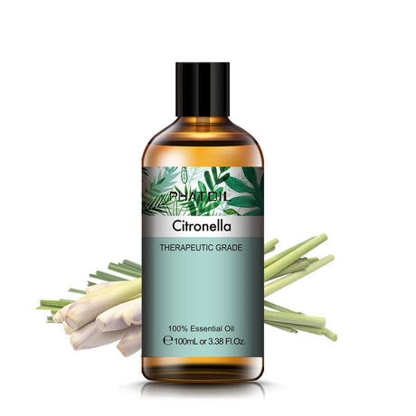 Bottle of Citronella essential oil with a label and citronella grass on a white background