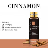 Mayu Jam Cinnamon Essential Oil bottle with cinnamon sticks on a white background